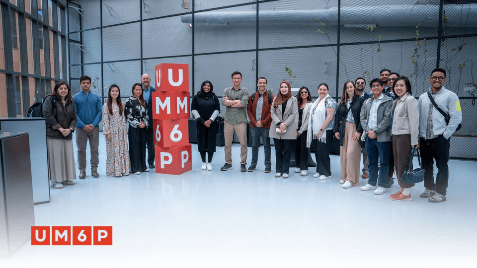 MBA students from Boston University and UM6P representatives pose for a group photo during their visit to the UM6P campus in Benguerir.  